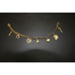 18ct gold charm bracelet 9.3g