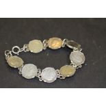 Silver bracelet set with 8 Geo V Silver 3 Penny Pieces - dates 1918/35 20.7 gr