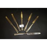 Set of six solid silver knives