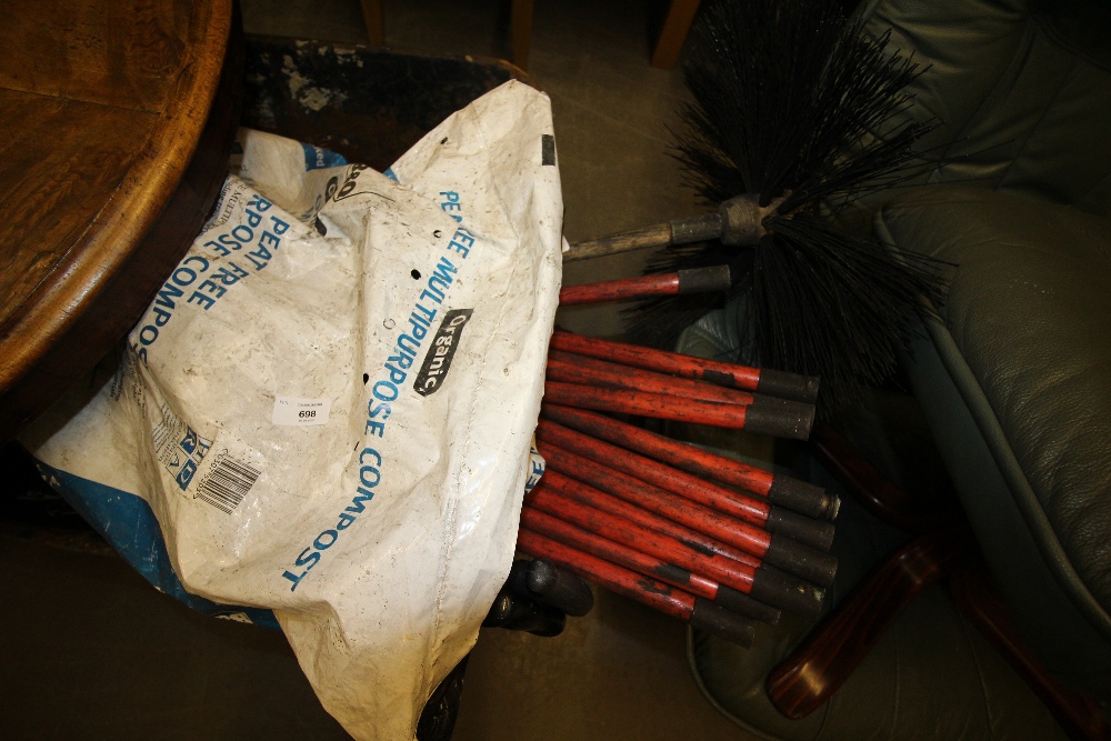 Wheel barrow and chimney sweep brushes inc three x walking sticks