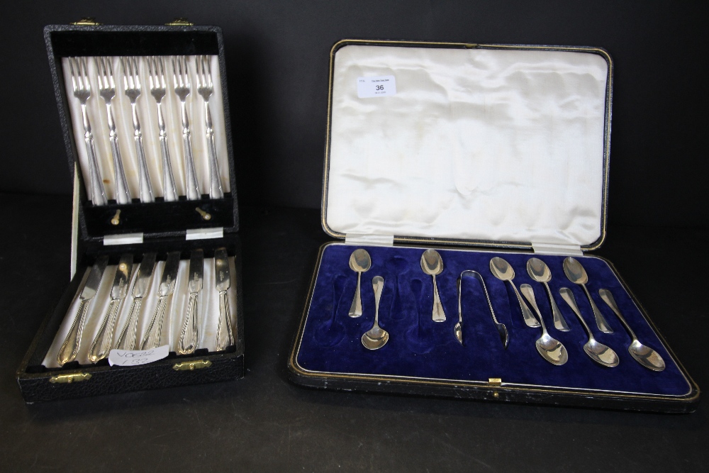 Cased set of ten silver spoons, sugar tongs (3 spoons are missing out of the set) with complete