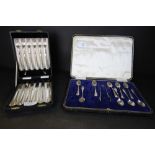 Cased set of ten silver spoons, sugar tongs (3 spoons are missing out of the set) with complete