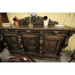 Victorian carved oak sideboard with later feet