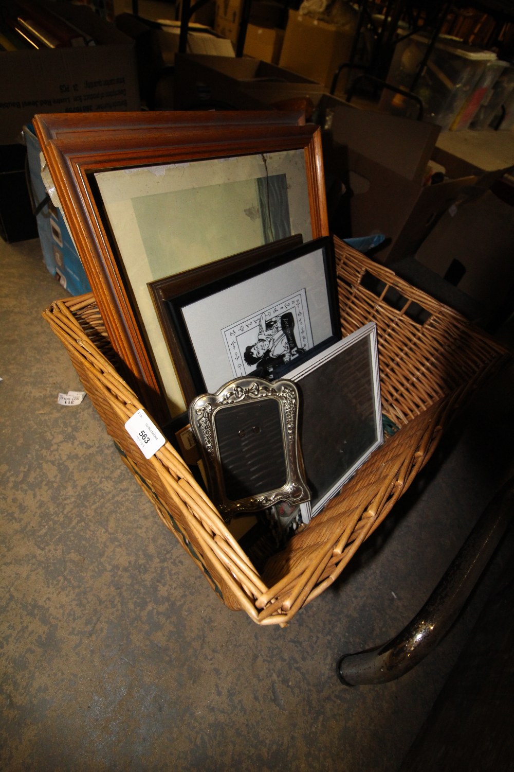 Basket of assorted picture frames