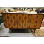 Mid Century teak and satinwood Atomic pattern sideboard designed by Robert Heritage for Vanson