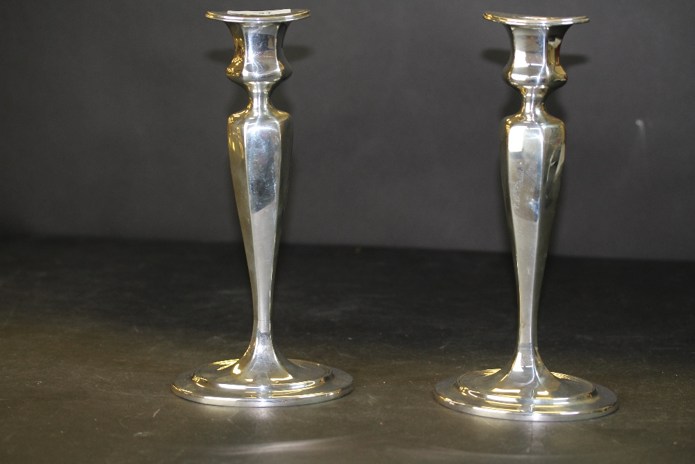 Pair of early 20th Century Tiffany & Co sterling silver candlesticks of plain baluster shape, 938