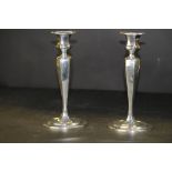 Pair of early 20th Century Tiffany & Co sterling silver candlesticks of plain baluster shape, 938