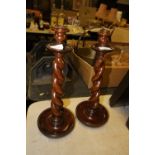 Pair of oak candlesticks