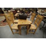 Pine drop-leaf table and 4 chairs