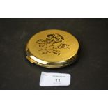 Gilt metal Stratton powder compact