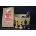 Box of Staunton boxwood chess pieces