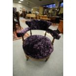 Pair of Victorian Walnut nursing chairs with purple velvet upholstery