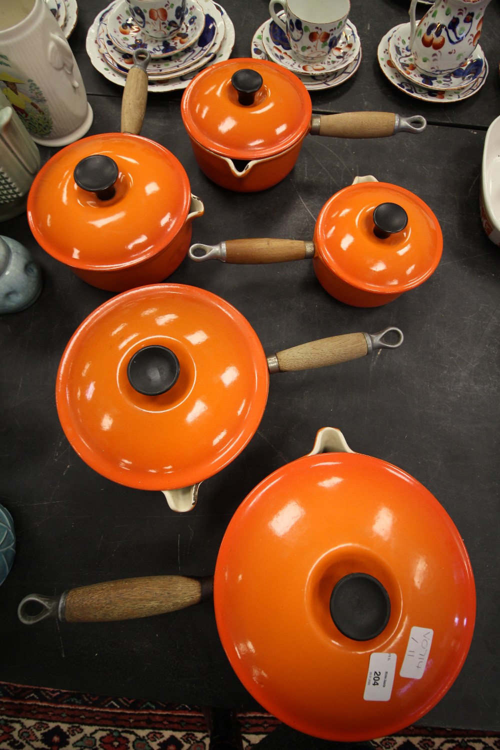 Complete set of 5 Le Creuset Pans, with lids, volcanic orange