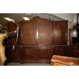 George IV mahogany breakfront bookcase with wire mesh doors, 324cm wide x 45cm deep x 220cm high,