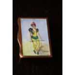 Victorian brass vesta case, enamelled to lid with a female performer (slight enamel ware and