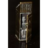 Late Victorian brass sentry box vesta case, door opening to reveal silvered seated porter figure