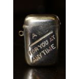 Early 20th Century silvered brass vesta case worded 'A (match) for you at any time' (enamel loss)