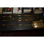 Good set of three late 18th/early 19th Century brass and copper handled fire irons and later holder,