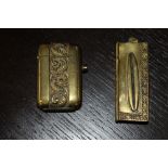 Victorian brass vesta case, the 'strike' set to lid and modelled as a razor clam, and one other
