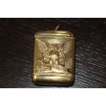 Early 20th century brass vesta case, embossed to front with an owl