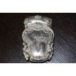 Large American Art Nouveau sterling silver vesta case, embossed with flowers and scrolls, stamped