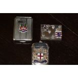 Three enamelled plated/chromed vesta cases - city of London, Windsor and Bruges (latter worn)