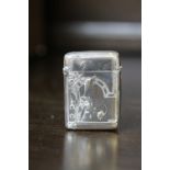 Early 20th Century Dutch 900 grade silver vesta case of Art Nouveau design, embossed with flowers,