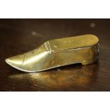 Late Victorian brass shoe vesta case with integral cigar cutter