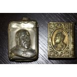 Two Edward VII vesta cases, one brass book pattern worded 'Long Live The King', the other plated (
