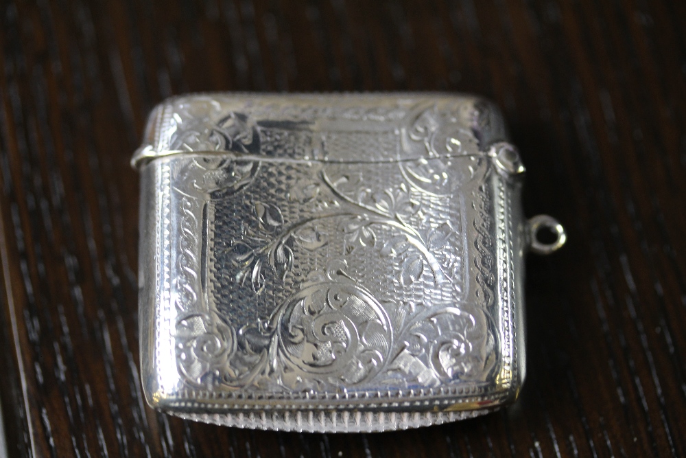 Edward VII silver vesta case by W.A., curved body with scroll bordered cartouche decorated to front, - Image 2 of 3