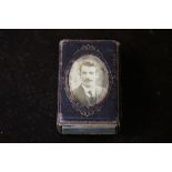 Early 20th century cloth match box case, inset with miniature portrait, worded to side 'Jack