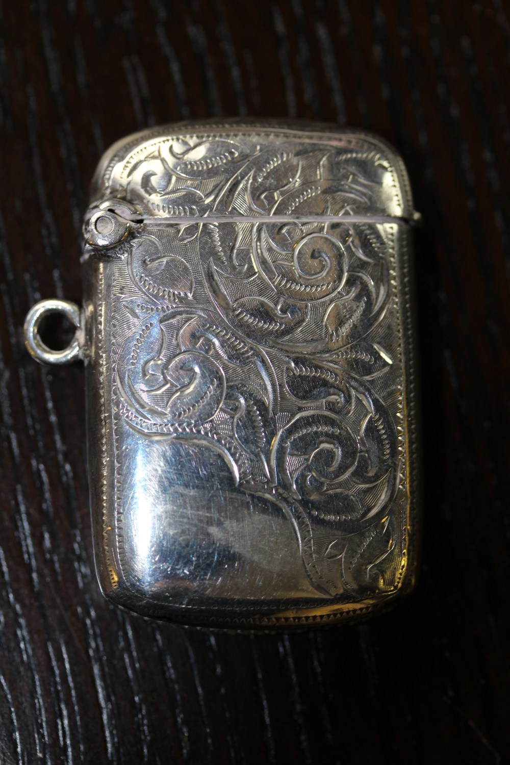 Late Victorian silver vesta case, engraved leaf scrolls Birmingham 1899, 19 grams