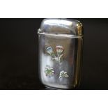 Early 20th Century white metal vesta case with champlevé floral enamelling