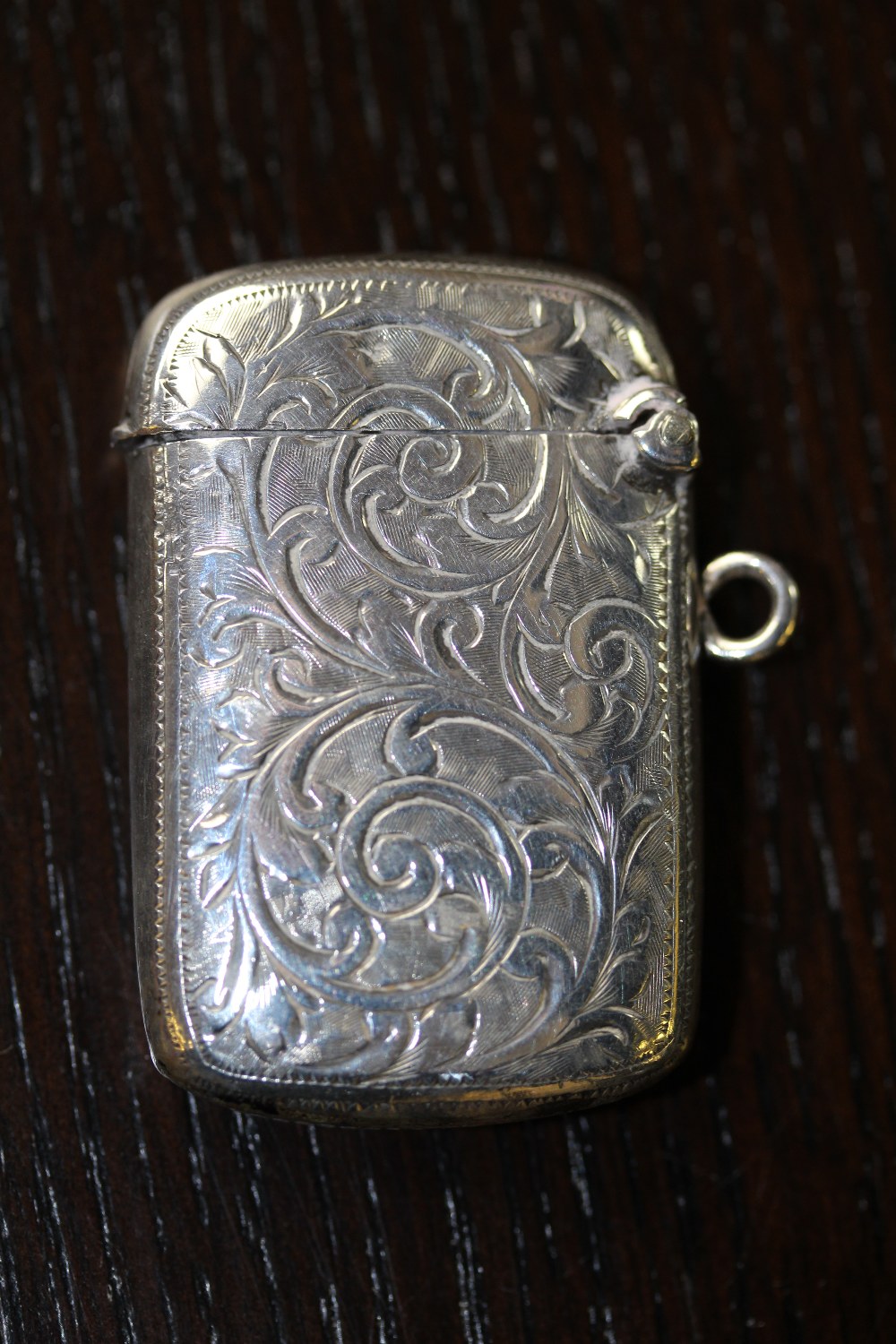 Late Victorian silver vesta case, engraved leaf scrolls Birmingham 1899, 19 grams - Image 2 of 2