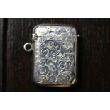 Edward VII silver vesta case by J.B. LTD, leaf scroll engraving, Birmingham 1909