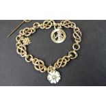 9ct gold Bracelet with 3 charms including enamelled Yorkshire Rose 24gms
