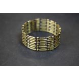 Gilt metal 4 bar gate bracelet/bangle