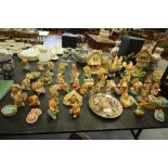 Large quantity of Pendelfin Rabbits, display stands and porcelain plate