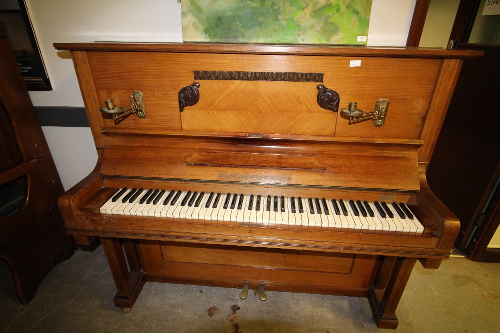 Edwardian German walnut overstrung piano by Max Neumeyer, Berlin. with Brass candle sconces -