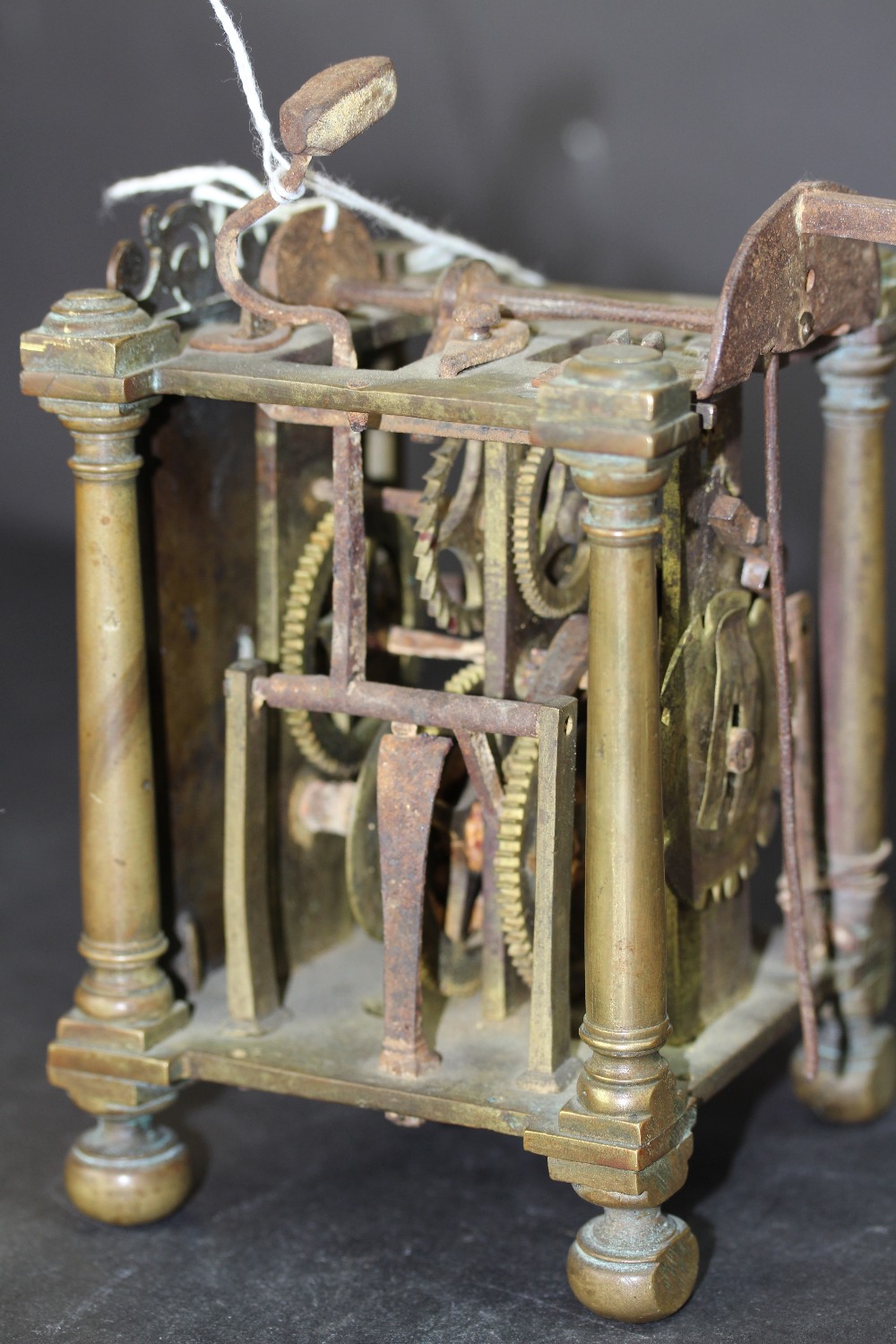 Early 18th Century brass Lantern Clock mechanism, retaining face but lacking hand, bell and sides, - Image 6 of 9