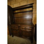 Oak linen fold dresser and rack