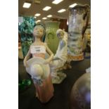 2 Lladro figurines (1 with slight damage)