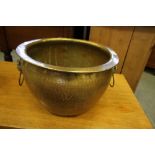 A Chinese brass bowl embossed with animal handles (14W, 9H)