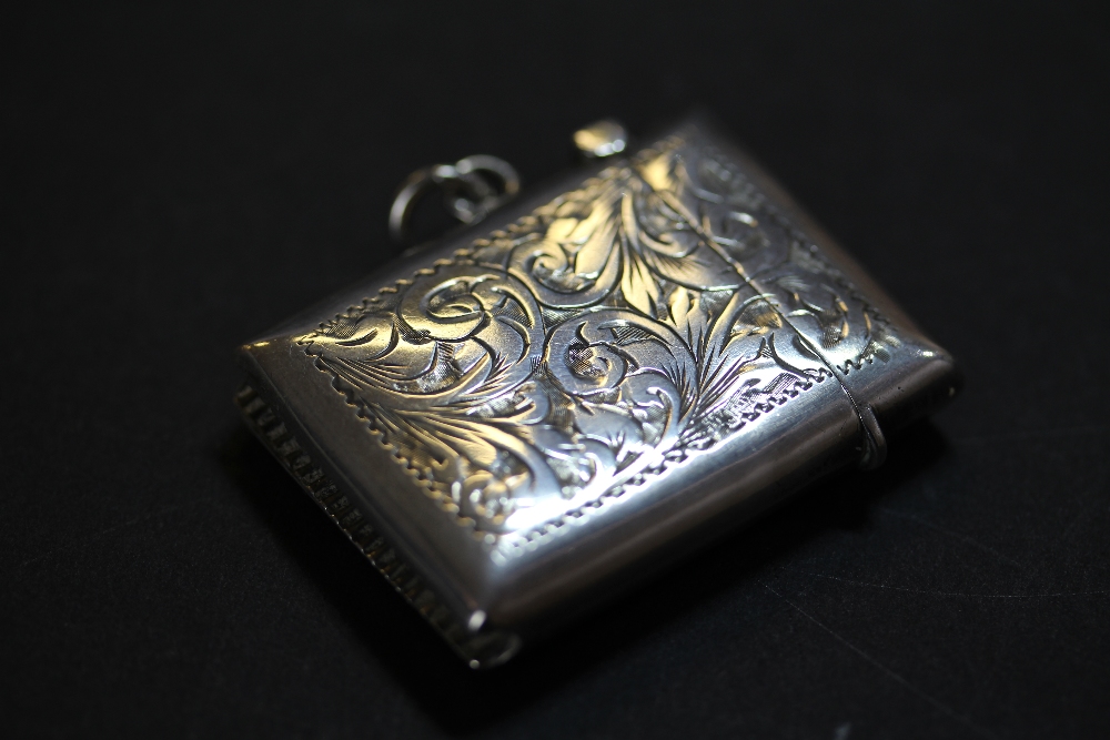 Foliate engraved silver vesta case