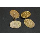 Pair of late Victorian gents 9ct gold cufflinks by J.M., with textured oval faces, Birmingham