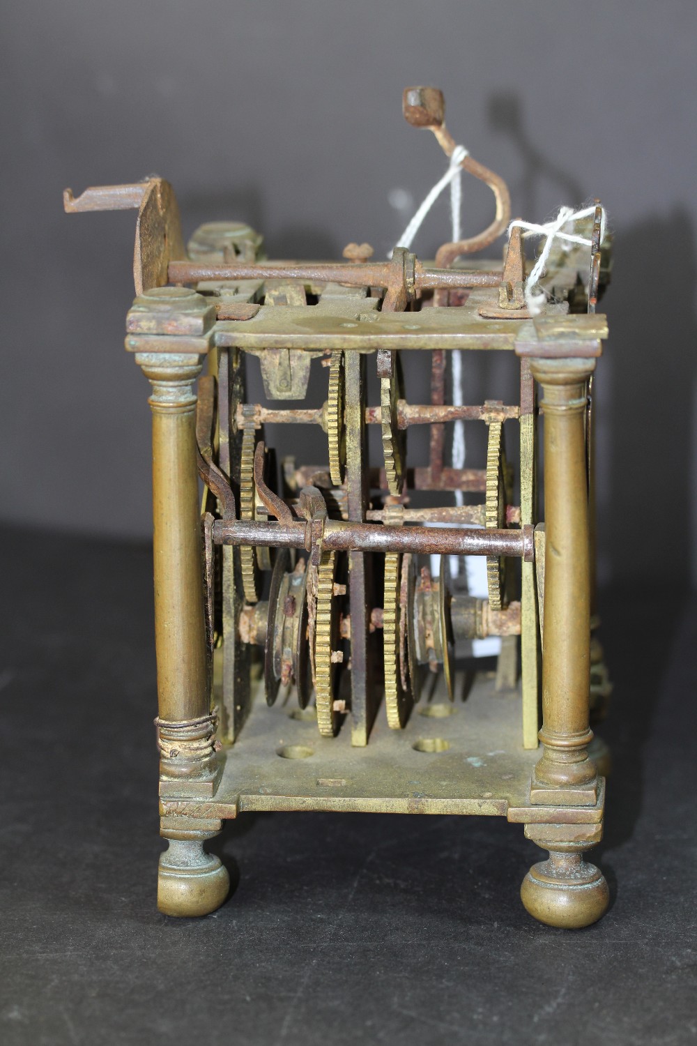 Early 18th Century brass Lantern Clock mechanism, retaining face but lacking hand, bell and sides, - Image 3 of 9