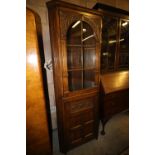 Carved oak corner cupboard