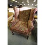 Wing back upholstered armchair