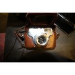 A Japanese Aretta camera circa 1960s, leather case
