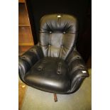 1970s black vinyl swivel chair